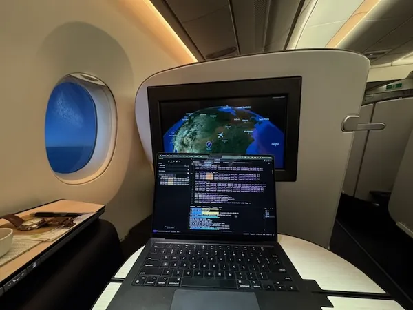 Matt Gardner coding on a flight