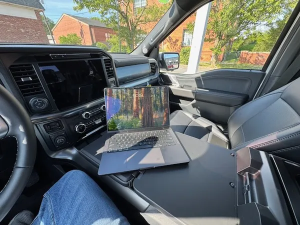 Matt Gardner working from a truck cab